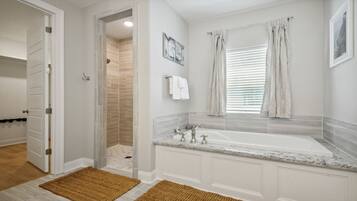 Combined shower/tub, hair dryer, towels, soap