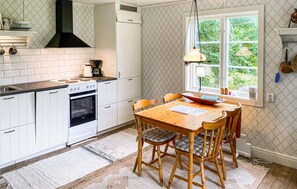 Fridge, stovetop, dishwasher, coffee/tea maker