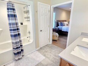 Combined shower/tub, hair dryer, towels, soap