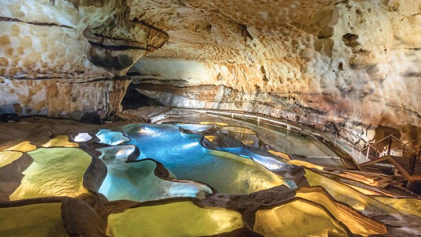 A cave with a natural pool and rock formations. - 2 bedroom gorgeous apartment in Orange (Orange)