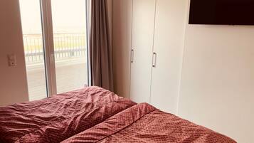 2 slaapkamers, een strijkplank/strijkijzer, gratis wifi, beddengoed