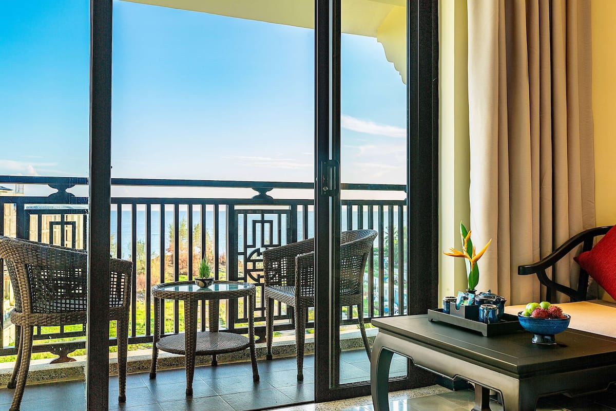 Deluxe Room, 1 Queen Bed, Balcony (Ocean/Riverside View) | 1 bedroom, minibar, in-room safe, desk