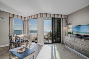 Indulge in dining with a view in our suite, where the dining area is strategically positioned to maximize the ocean panorama, providing an exquisite backdrop for every meal.