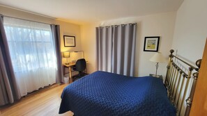 3 bedrooms, desk, iron/ironing board, travel cot