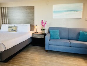 Tabla de planchar con plancha, wifi gratis y ropa de cama