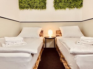 Desk, free WiFi, bed sheets