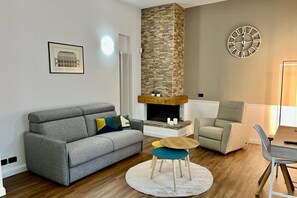 Flat-screen TV, fireplace