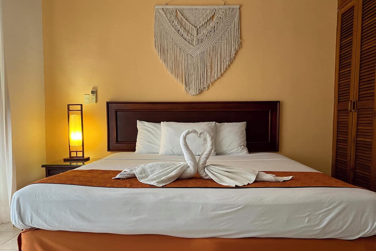 Family Apartment, 1 Bedroom, Balcony, Beach View | 1 bedroom, premium bedding, down comforters, in-room safe