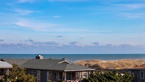 A coastal house with a view of the ocean and dunes. - 6151 Once Upon a Tide * Almost Oceanfront (Nags Head)