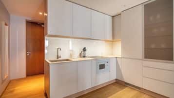 Departamento Confort | Cocina privada | Refrigerador con congelador, parrilla de estufa y lavavajillas