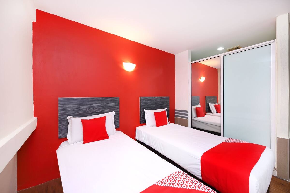 Habitación Deluxe con 2 camas individuales | Wifi gratis y ropa de cama