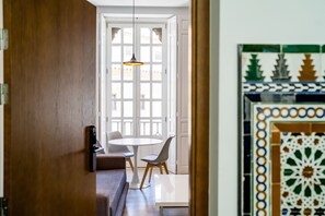 Deluxe Apartment, 2 Bedrooms | Living area | 50-inch flat-screen TV with cable channels, TV - Casa Palacio La Casa Blanca Suites (Seville)