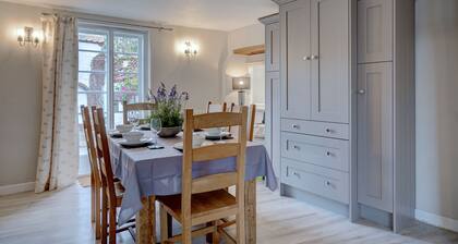 Three double bedroom fisherman’s cottage-breathtaking views across RSPB marshes.