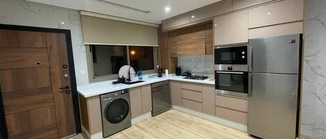 Fridge, cookware/dishes/utensils, paper towels