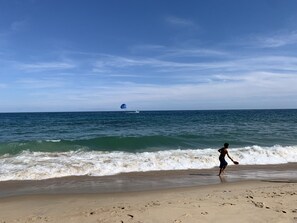 On the beach, sun loungers, beach towels