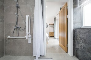Combined shower/tub, hair dryer, towels, soap