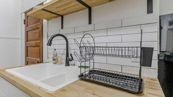 Bathtub, hair dryer, towels