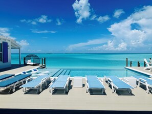 Outdoor pool, an infinity pool - Luxury beachfront home, Heated private pool, Five King suites w/ ensuite baths! (Georgetown)