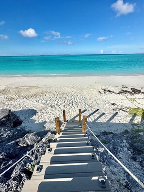 On the beach, sun-loungers, beach towels