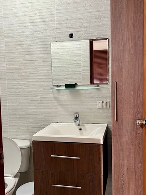 Shower, towels, soap, toilet paper