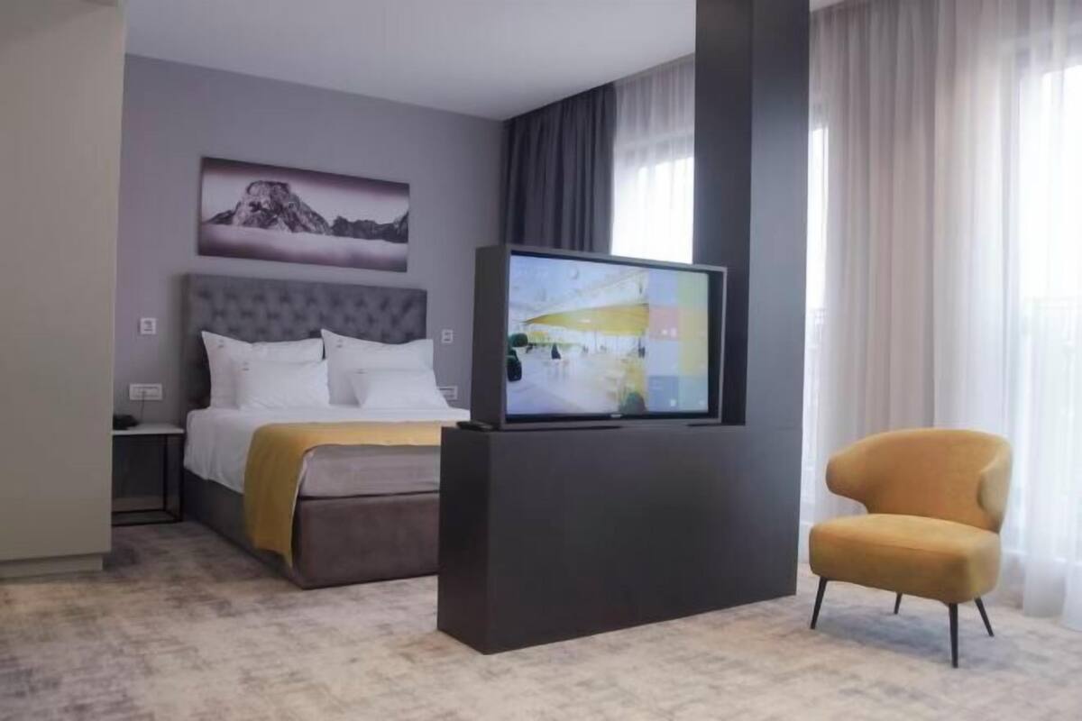 Premium bedding, memory foam beds, minibar, in-room safe