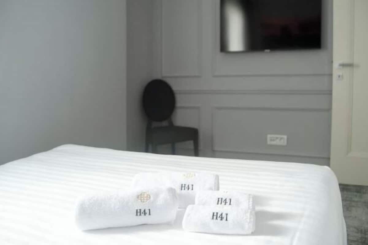 Premium bedding, memory foam beds, minibar, in-room safe