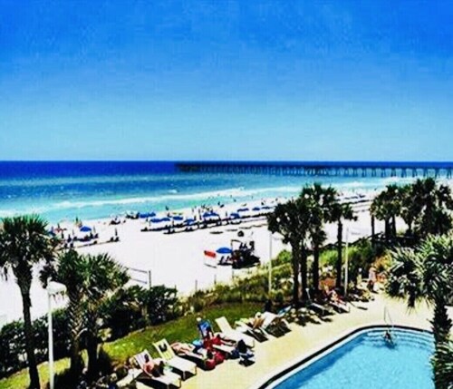 OCEAN FRONT PROPERTY next to Pier Park with pools, hot tib, tiki bars 