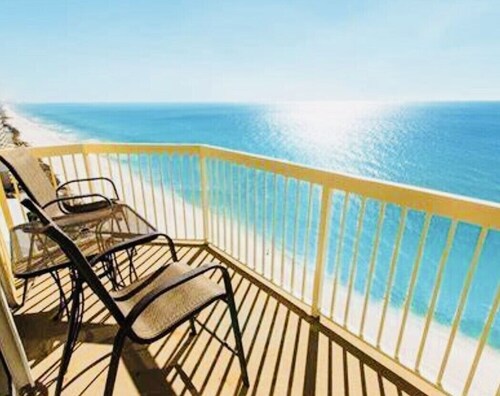 OCEAN FRONT PROPERTY next to Pier Park with pools, hot tib, tiki bars 