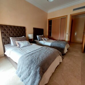 2 slaapkamers, een strijkplank/strijkijzer, gratis wifi, beddengoed