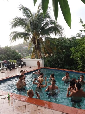 Outdoor pool, open 10:00 AM to 10:00 PM, pool loungers