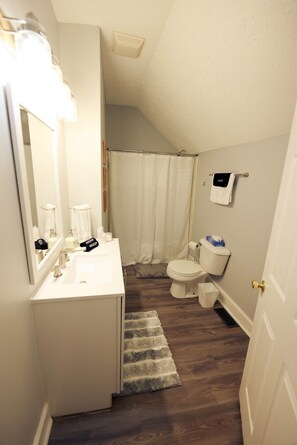 Hair dryer, towels, soap, shampoo