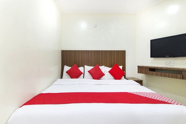 Habitación triple Deluxe | Escritorio, wifi gratis y ropa de cama 
