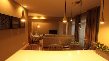 Superior Apartment | Living area | 50-inch LCD TV with digital channels, TV, heated floors
