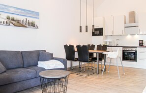 Apartamento | Sala de estar | TV