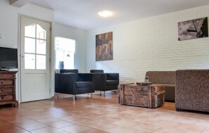 شقة (Vakantiewoning 1) | غرفة المعيشة | تلفزيون، تنس طاولة