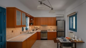 Fridge, oven, stovetop, espresso maker