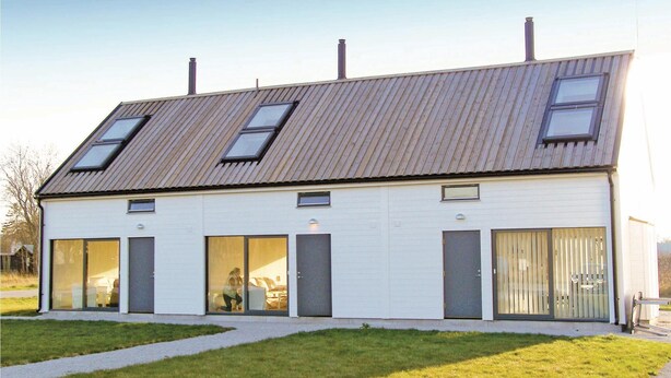 A modern two-story house with large windows and a sloped roof. - Awesome Home in Burgsvik With 3 Bedrooms and Wifi (Burgsvik)