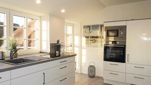 Departamento | Cocina privada | Refrigerador y utensilios de cocina 