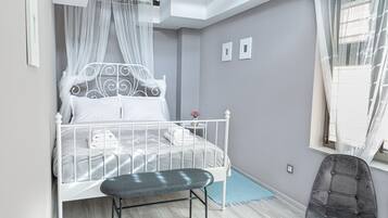 2 bedrooms, in-room safe, iron/ironing board, travel cot