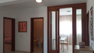 Family Apartment, 2 Bedrooms, 2 Bathrooms, Beachside | Living area | TV