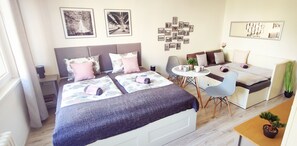 1 bedroom, desk, bed sheets