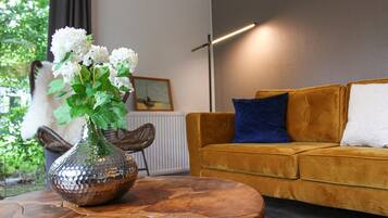 Huis (Chalet 11) | Woonkamer | Een smart-tv