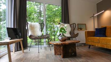 Huis (Chalet 11) | Woonkamer | Een smart-tv