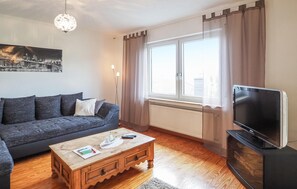 Apartamento | Sala de estar | TV