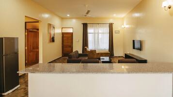 Comfort Apartment | Living area | TV