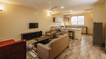 Comfort Apartment | Living area | TV