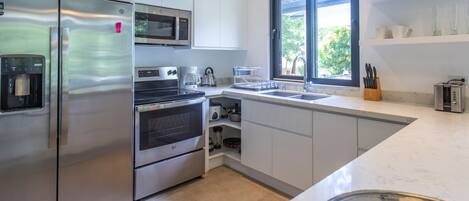 Fridge, microwave, coffee/tea maker, toaster