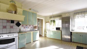 Casa | Cocina privada | Refrigerador y utensilios de cocina
