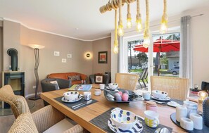 Ferienhaus (Meerzeit) | Wohnzimmer | Fernseher