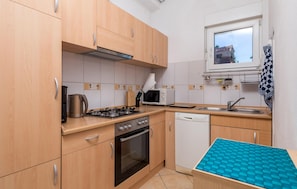 Apartment | Private kitchen | Fridge, cookware/dishes/utensils